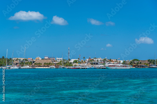 North beach on colorful Isla Mujeres island near Cancun in Mexico, view from the ferry photo