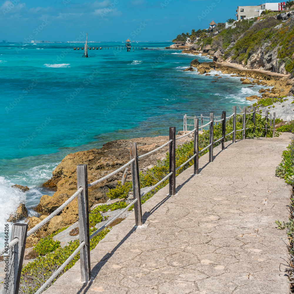 Walking way at the coastline on Isla Mujeres South Point Punta Sur Cancun Mexico Island turquoise water