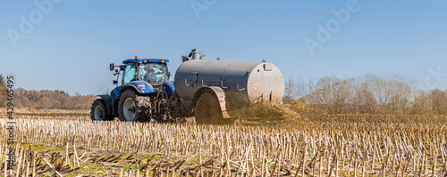 Tractor with slurry tank in the field | 5149 photo
