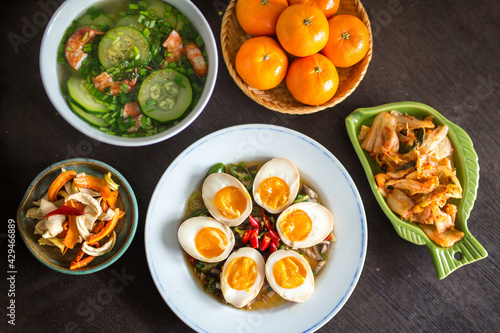 Asian family lunch set in Lunar New Year days with mayak eggs dish