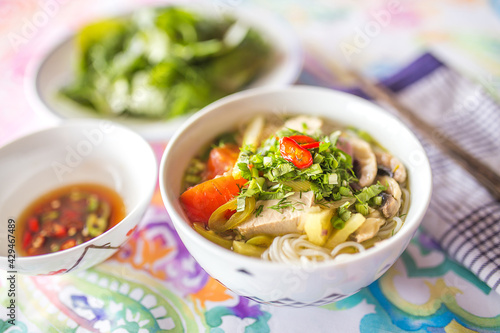 Rice vermicelli in soup with tuna and vegetables (Vietnamese food) 
