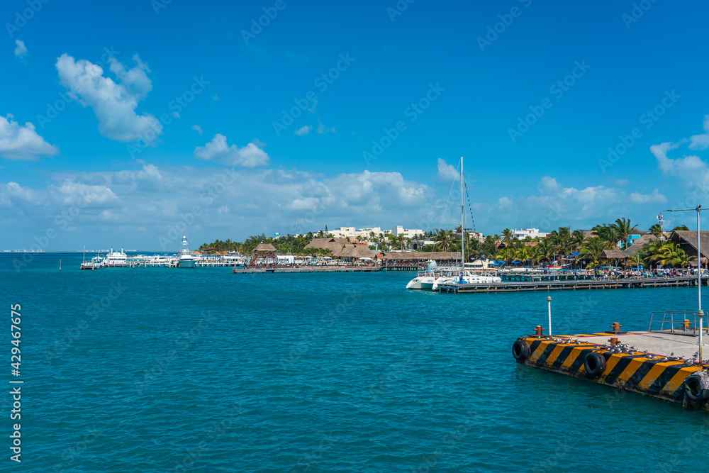 Coastline from Isla Mujeres with buildings and boats
