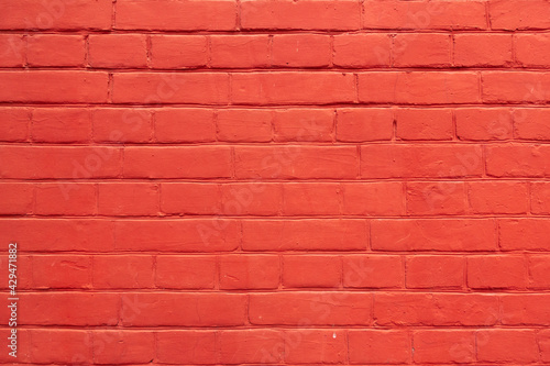 Painted Orange Brick Wall Texture Background. Pastel Painted House Surface Material Pattern.