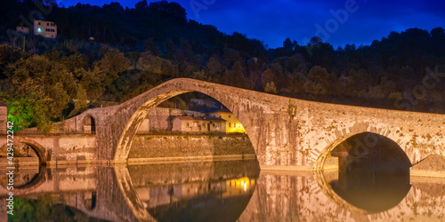 Devils Bridge at Night in Lucca, Italy photo