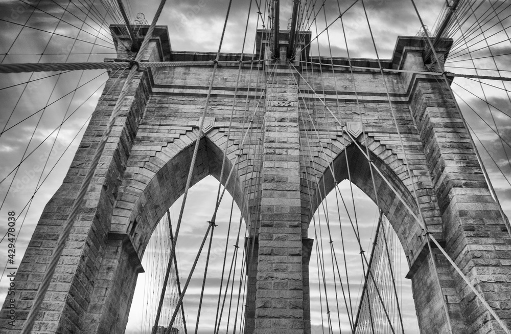 Fototapeta premium Sky colors on the background of Brooklyn Bridge Tower, New York City