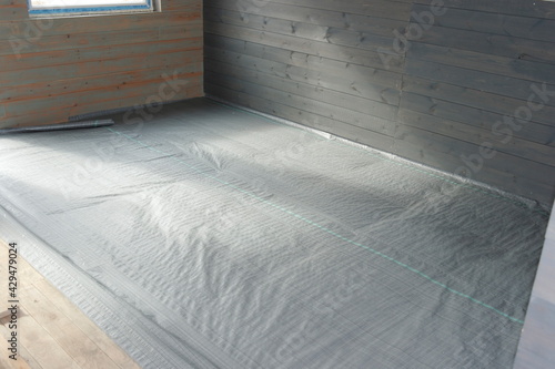 insulation of the floor in a frame house.