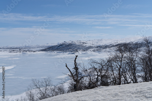 View of the frozen lake Sløddfjorden near the village of Haugastøl, in the municipality of Hol, Viken County, Norway, Scandinavia photo