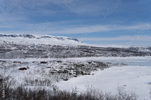 View of the frozen lake Sløddfjorden near the village of Haugastøl, in the municipality of Hol, Viken County, Norway, Scandinavia photo