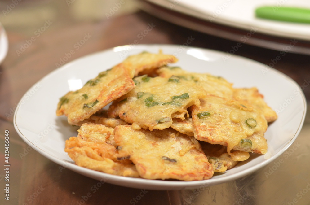 Fried tempeh or tempe (traditional Indonesian soy product) Fried tempeh or tempe (traditional Indonesian soy product)