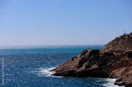 cliffs at the coast of azure mediterranean sea
