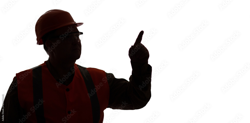silhouette of stout man in hard hat on white isolated background, foreman managing, showing finger direction, building industry concept