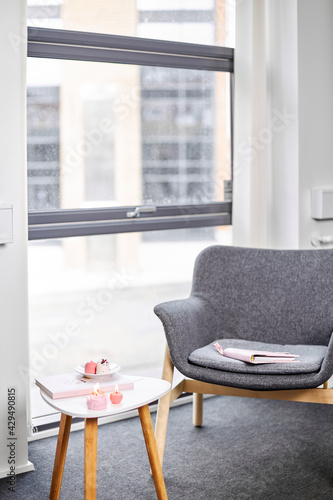 A chair sitting in front of a window