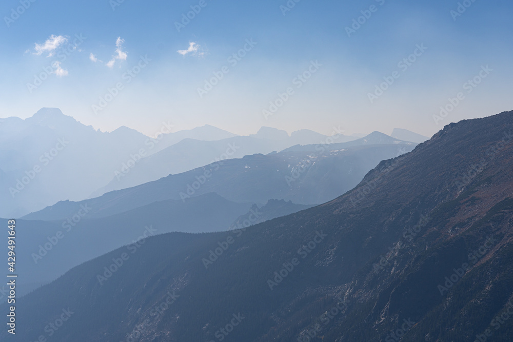 Layers to these layers player. Layered mountain range in the colorado rocky mountains.