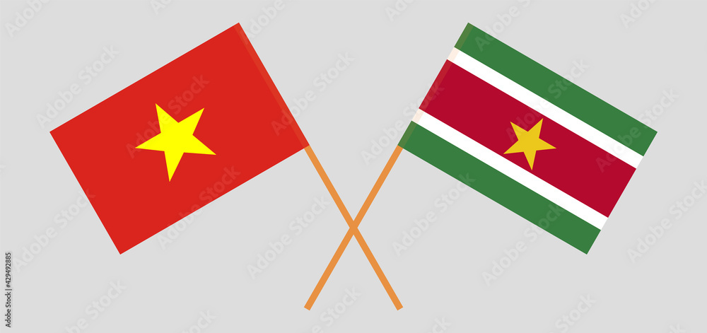 Crossed flags of Vietnam and Suriname. Official colors. Correct proportion Crossed flags of Vietnam and Suriname. Official colors. Correct proportion