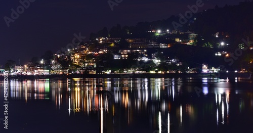 Night view reflection of lots of light in the lake.(selective focus) © Daniyal