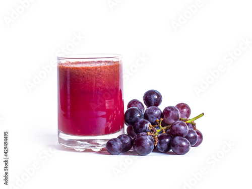 Wallpaper Mural Red grape juice in glass and grape fruit isolated on white background Torontodigital.ca