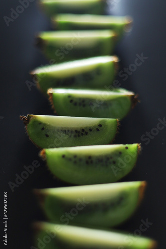 Sliced kiwi in low key