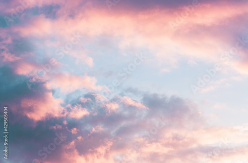 Beautiful sunset sky with pink and purple clouds