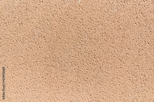 Wallpaper Mural Sunlit wall in salmon tones. Flat surface. Torontodigital.ca