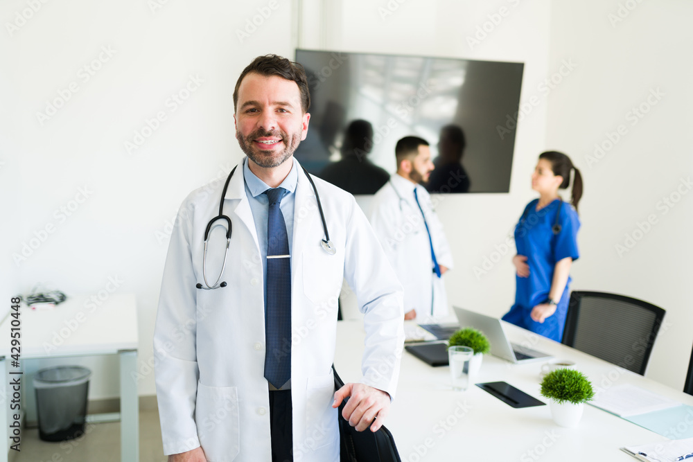 Doctor ready to talk with his colleagues Doctor ready to talk with his colleagues