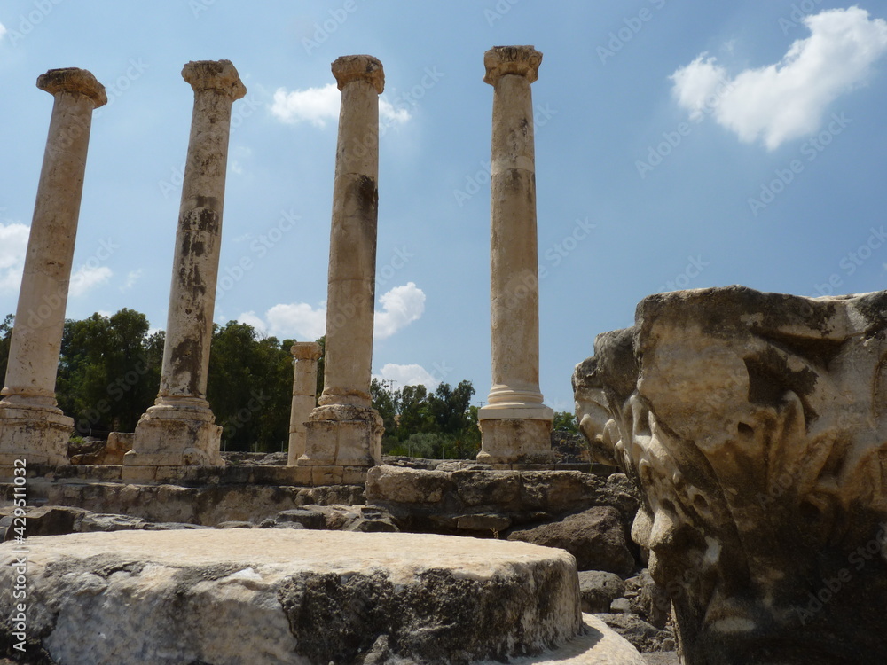 ruins of a city with columns stand up