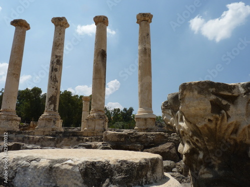 ruins of a city with columns stand up