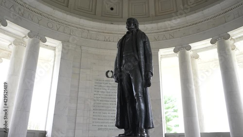 Turning shot of Thomas Jefferson inside the Jefferson Memorial on the National Mall in Washington, DC. photo