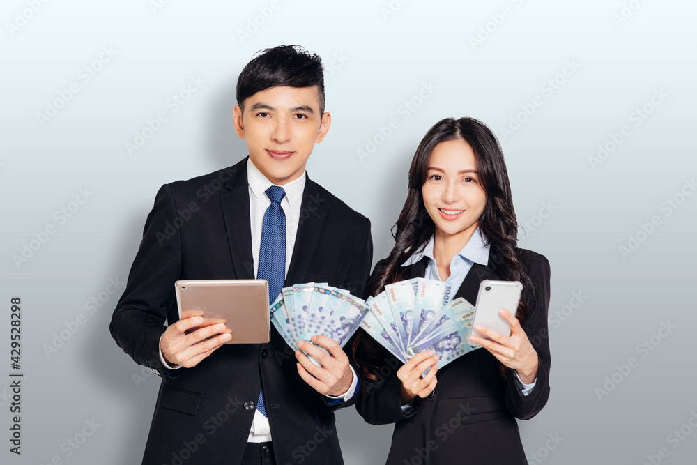 Happy business couple showing the money and smart phone Happy business couple showing the money and smart phone