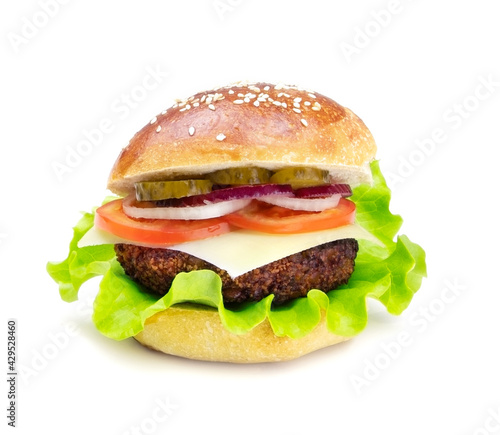 Cheeseburger isolated on a white background. Hamburger with cheese. Burger isolated. Copy space. Tasty dinner