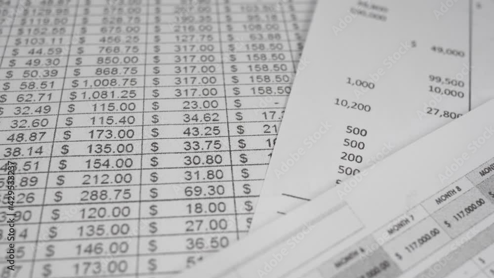 Accounting Spreadsheets Papers With Many Numbers Closeup Accounting Spreadsheets Papers With Many Numbers Closeup