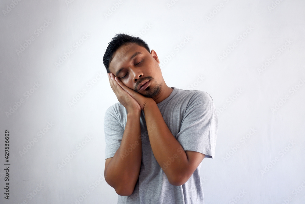 tired man sleep while standing, sleepy boy with eyes closed tired man sleep while standing, sleepy boy with eyes closed