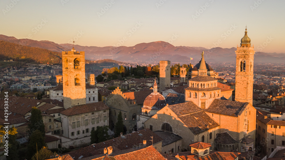 Bergamo, Italy. Amazing drone aerial view of the Old city. One of the beautiful city in Italy. Landscape at the city center and the historical buildings during sunset