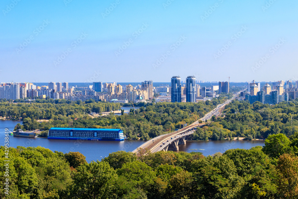 Naklejka premium Aerial view of Metro bridge and the Dnieper river in Kiev, Ukraine. Kyiv cityscape