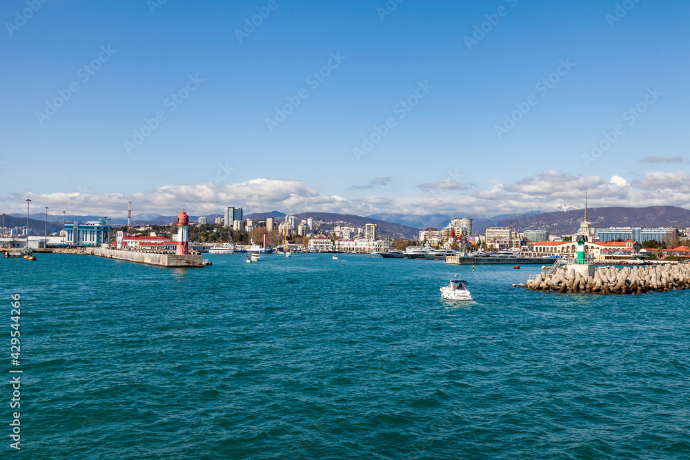 Sochi, Russia, April 13, 2021. View of the picturesque embankment of the Sochi Marina from the board of a pleasure ship