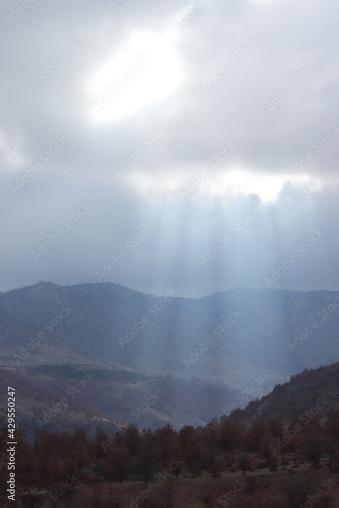 Sunlight Beams on Mountain. Beautiful mountain landscape background. Sunlight Beams on Mountain. Beautiful mountain landscape background.