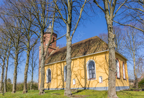 Historic yellow church of Wehe-Den Hoorn © venemama