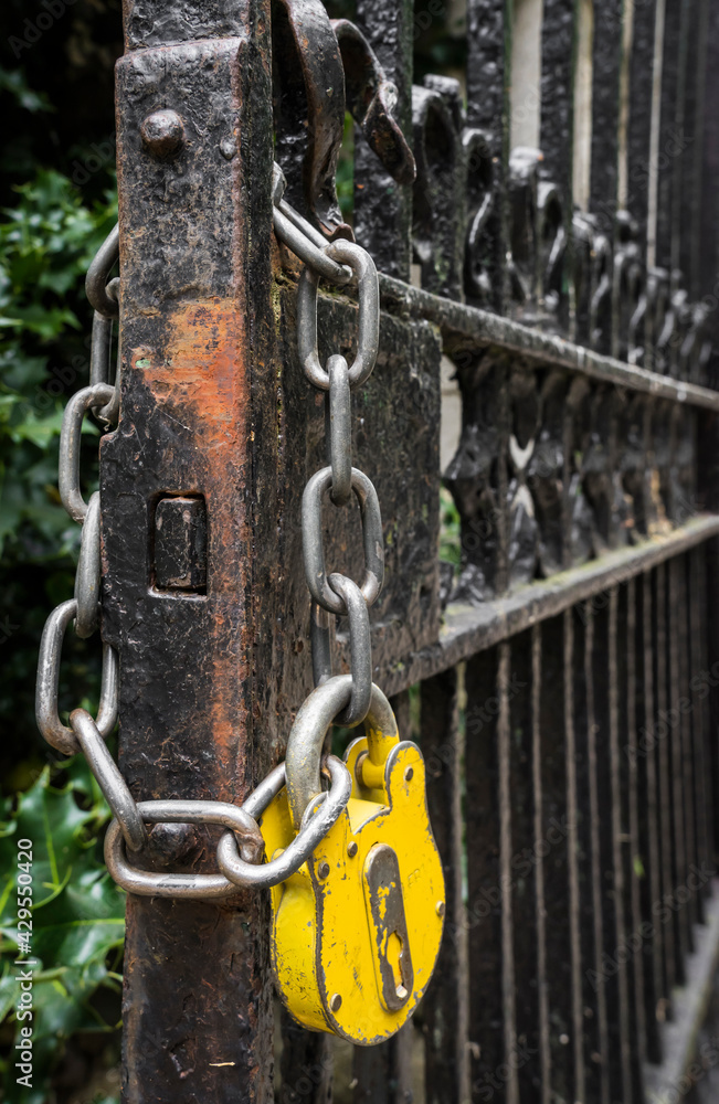 rusty gate with chain and padlock rusty gate with chain and padlock