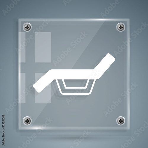 White Sunbed icon isolated on grey background. Sun lounger. Square glass panels. Vector