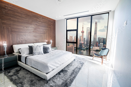 Photography Modern and luxurious hotel bedroom with views of Shanghai Lujiazui Pudong skyline