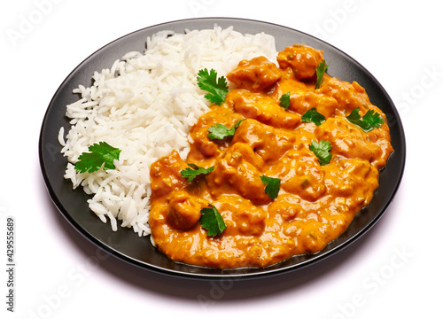 Plate of Traditional Chicken Curry isolated on white background with clipping path embedded