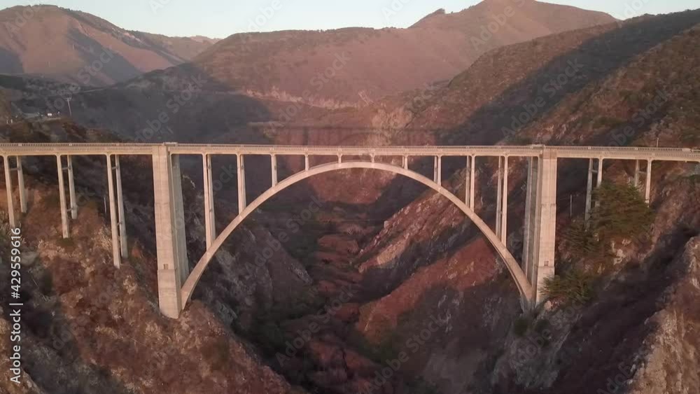 Scenic View Of Steel Bridge Connecting Mountains - aerial shot Scenic View Of Steel Bridge Connecting Mountains - aerial shot
