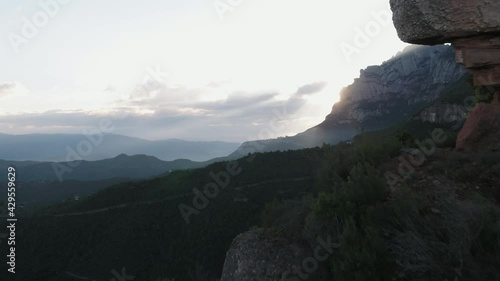 Santa Maria De Montserrat Backlit Sunlight At Dawn In Barcelona, Catalonia, Spain. - Zoom In Shot photo