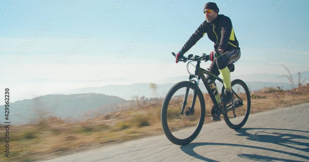 Man riding his bicycle Man riding his bicycle