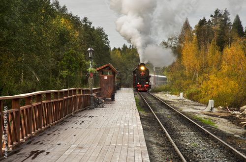 Ruskeala Express at railway station Mountain Park Ruskeala. Republic of Karelia. Russia photo