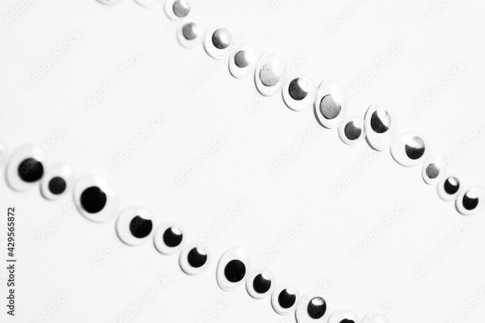 Parallel lines from toy eyes on white background Parallel lines from toy eyes on white background