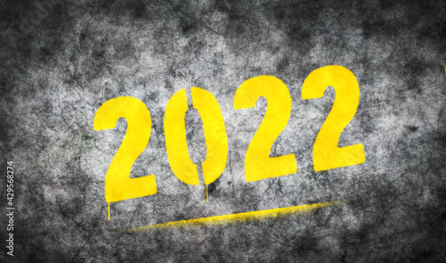 2022 year sign spray painted on the concrete wall