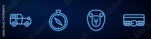 Set line Wild lion, Off road car, Compass and Hunting cartridge belt. Glowing neon icon on brick wall. Vector