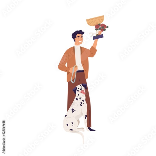 Portrait of dalmatian and happy pet owner holding golden cup for doggy show's...