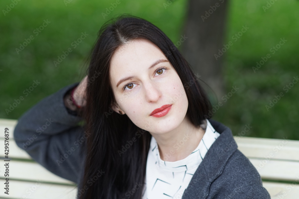 Portrait of a young beautiful girl in the park Portrait of a young beautiful girl in the park