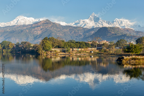 Fewa Lake at Pokhara with the snow capped Annapurna mountain range in the background
